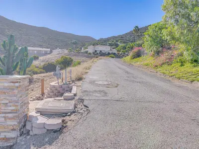 an empty road with a pile of bricks on the side at The Creek Retreat - Totally private 1Br/1Bd in Newbury Park