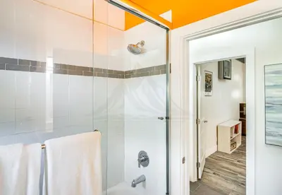 a bathroom with a shower with a glass door at The Creek Retreat - Totally private 1Br/1Bd in Newbury Park