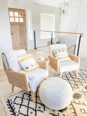 a living room with two chairs and a rug at NEW & Luxurious House, hot tub & amazing views in Lake Arrowhead
