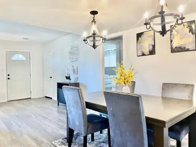 a dining room with a table and chairs at Glendora Pool Home Retreat in Glendora