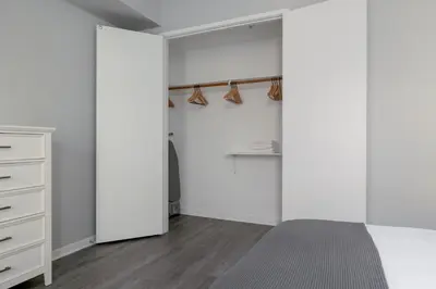 a bedroom with white walls and a bed and a closet at Marina Del Rey 1br w lounge gym spa nr marina LAX-1074 in Los Angeles