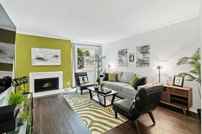 a living room with a couch and a fireplace at Beverly Hills Gem 1 BR Apt with Parking 218 in Los Angeles