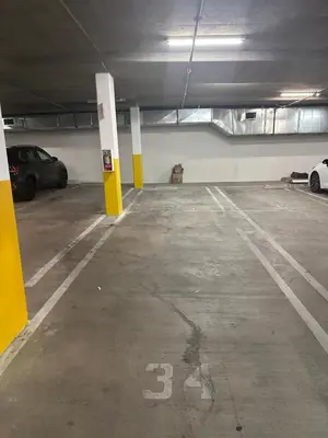 an empty parking garage with cars parked in it at Luxury 2Bed/2Bath Apt in West Hollywood w/ Rooftop in Los Angeles
