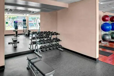 a fitness room with tread machines and balloons at Fairfield Inn & Suites by Marriott Los Angeles LAX/El Segundo in El Segundo