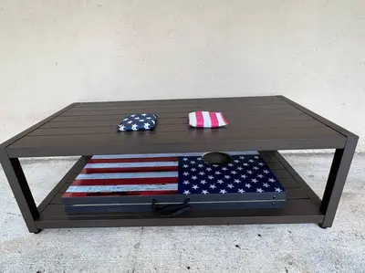 a coffee table with an american flag on it at Modern 3 King Beds, Beautiful Large Backyard, WFH, Long Stays, Waterfall, WI-FI, FWY, 25 mins to Beach in Thousand Oaks
