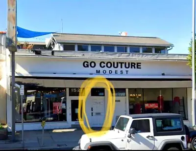 a white truck parked in front of a store at Los Angeles Zen Home in Los Angeles