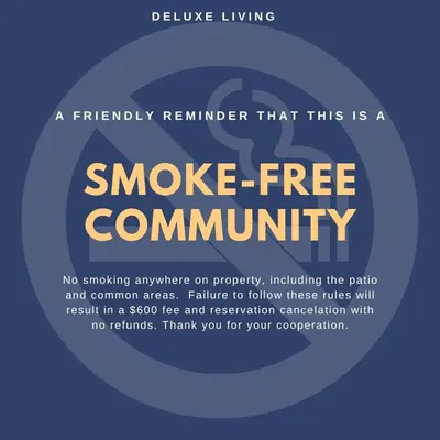 a reasonably reminder that this is a smoke free community poster at Modern King Suite Deluxe Living Cali in Santa Clarita