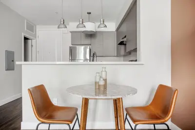 a kitchen with a table and two chairs at North Hollywood 1br w roof terrace nr bars LAX-1130 in Los Angeles
