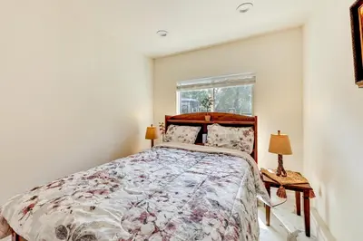 a bedroom with a large bed and a window at Anaheim Hills Retreat - 17 Mi to Disneyland! in Anaheim