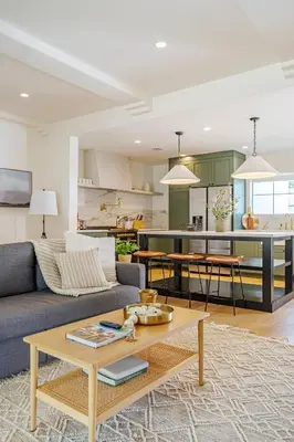 a living room with a couch and a table at Designer 2 bed near Universal sleeps 8 hot tub in Los Angeles