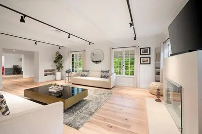 a living room with a couch and a table at Chic 3BR Oasis in Studio City:Toluca Lake Adjacent in Los Angeles