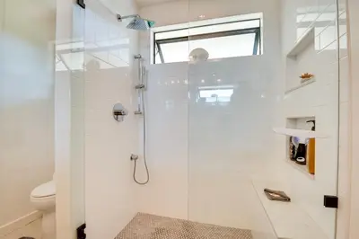 a bathroom with a shower and a toilet at Malibu Retreat with Balcony and Mountain Views in Malibu