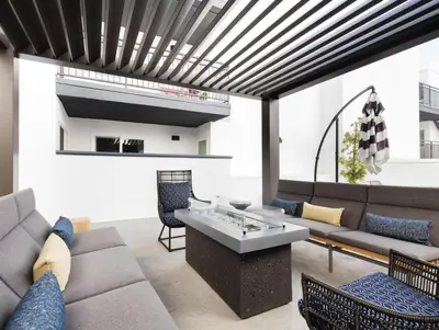 a living room with a couch and a table at Redondo Beach 1BR w Pool Gym 1 block from beach LAX-438 in Redondo Beach