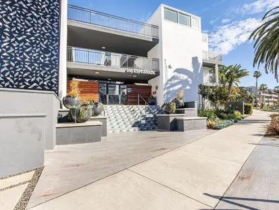aominium building with a walkway in front of it at Redondo Beach 1BR w Pool Gym 1 block from beach LAX-438 in Redondo Beach