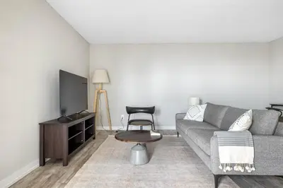 a living room with a couch and a chair at Redondo Beach 1BR w Pool Gym 1 block from beach LAX-438 in Redondo Beach