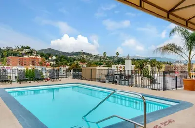 a swimming pool with a view of a city at Hollywood Apartments Mario & No Themed With Pool FREE parking and WIFI in Los Angeles