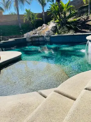 a swimming pool with blue water in a yard at Private-room-Private-entrance-spectacular-city-landscape-views-from-room in Rancho Cucamonga