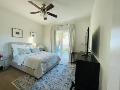 a bedroom with a bed and a ceiling fan at Private-room-Private-entrance-spectacular-city-landscape-views-from-room in Rancho Cucamonga