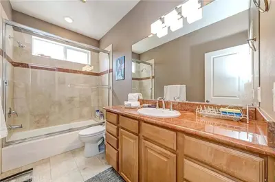 a bathroom with a sink and a shower and a toilet at Redondo Beach Suite, 2 BR 1st floor Surf Gym workspace in Redondo Beach