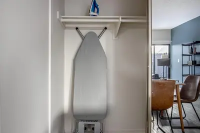 a surfboard hanging on a wall in a room at Westwood 1br close to UCLA LAX-1141 in Los Angeles