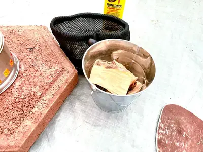 a piece of cake in a bucket next to a skateboard at Beysicair Tents & Campground in California City