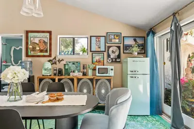 a dining room with a table and chairs at The Malibu Retreat Guest House - Salt Water Pool & Jacuzzi, Nature Oasis in Calabasas