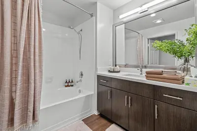 a bathroom with a tub and a sink and a shower at Luxury 2BDR with Parking & Pool - Marina del Rey in Los Angeles