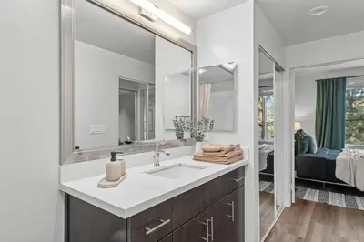 a bathroom with a sink and a mirror at Luxury 2BDR with Parking & Pool - Marina del Rey in Los Angeles