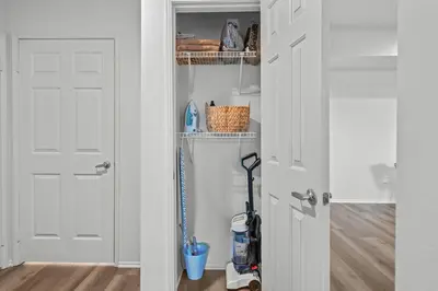 a closet with a door with a mop at Luxury 2BDR with Parking & Pool - Marina del Rey in Los Angeles
