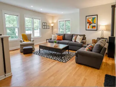 a living room with a couch and a table at Art District Downtown Spacious Homes in Los Angeles