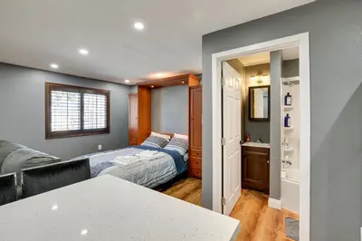 a bedroom with a bed and a couch in a room at Hidden Gem in Hawthorne about 3 Mi to SoFi Stadium in Hawthorne