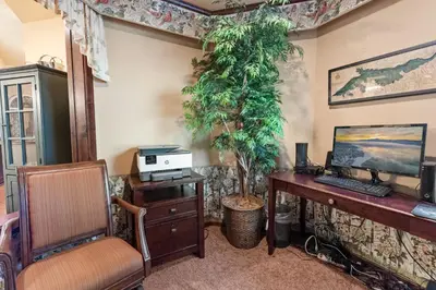 an office with a desk and a computer and a chair at Big Bear Villa - Walk to Lake ad Village! Hot Tub, Jet Tub and so much more! in Big Bear Lake