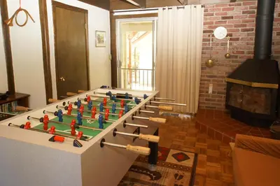 a room with a table with a chess board on it at Kapers - Located in a beautiful quiet area of Big Bear Lake, walking distance to Snow Summit! in Big Bear Lake