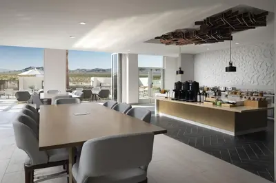 a dining room with a table and chairs at TownePlace Suites by Marriott Marriott Barstow in Barstow