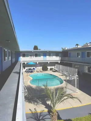 arial view of a swimming pool in a building at Spacious Studio close to LAX and close to beaches! in Gardena