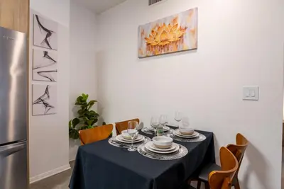 a dining room table with a blue table cloth at Cozy Huge LOFT for Live and Work in Los Angeles