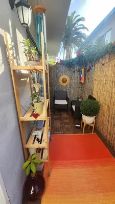 a room with a staircase with plants on it at Cozy Private Room & Bath Central Location LA in Los Angeles