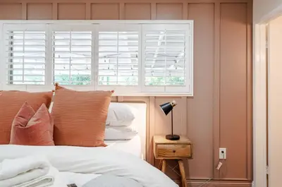 a bedroom with a bed and a window at Elegant Retreat w/ Game room in Heart of OC in Midway City