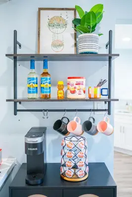 a kitchen with a coffee maker on a shelf at Retreat Minutes To LAX, Manhattan/ Redondo Beach in Torrance
