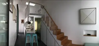 a bathroom with a staircase with a sink and a sink at Dogtown Loft in Los Angeles