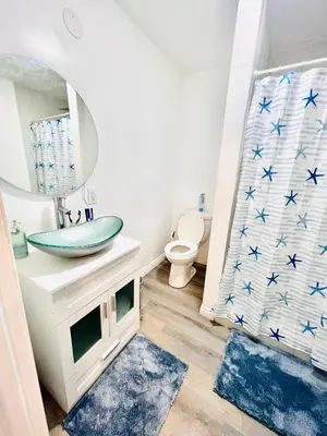 a bathroom with a sink and a shower at Cozy Room with Private bathroom & Entrance in Carson