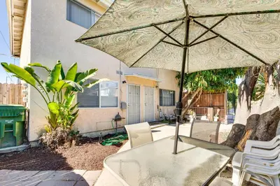a table with an umbrella on a patio at 3 Mi to Universal Studios North Hollywood Home in North Hollywood