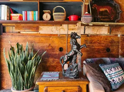 a statue of a bear sitting on a table in a room at Serene Studio, Yurt Barn near DTLA Silverlake in Glendale