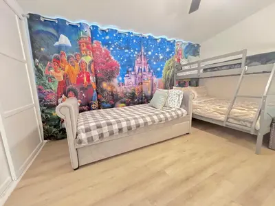 a room with two bunk beds and a mural at Disneyland Retreat-Pool Spa Game in Anaheim