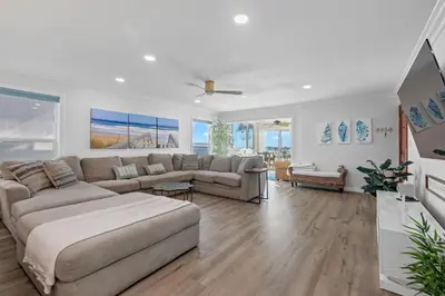 a living room with a couch and a table at On the Boardwalk in Long Beach