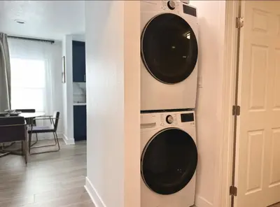 two washers and a dryer in a room at Coastal Escape in Redondo Beach in Redondo Beach