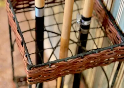 two baseball bats in a basket on a bike at Peaceful Cabin Home with Breathtaking View! in Big Bear City