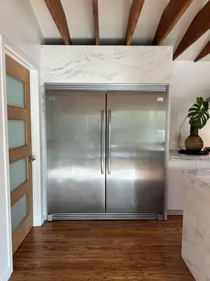 a stainless steel refrigerator in a room with a ceiling at Spacious Resort Getaway @ Echo Park Ranch - Luxury indoor/ outdoor home steps from Sunset Blvd, Echo Park Lake, Dodgers Stadium in Los Angeles