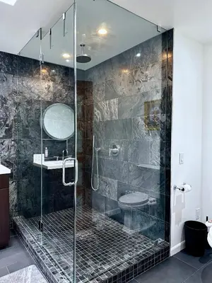 a bathroom with a glass shower with a sink at Spacious Resort Getaway @ Echo Park Ranch - Luxury indoor/ outdoor home steps from Sunset Blvd, Echo Park Lake, Dodgers Stadium in Los Angeles