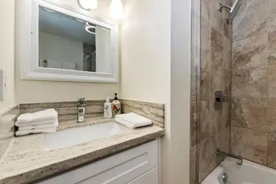 a bathroom with a sink and a shower at Modern Moab: Near Boulder Bay + Spa + Large Yard in Big Bear Lake